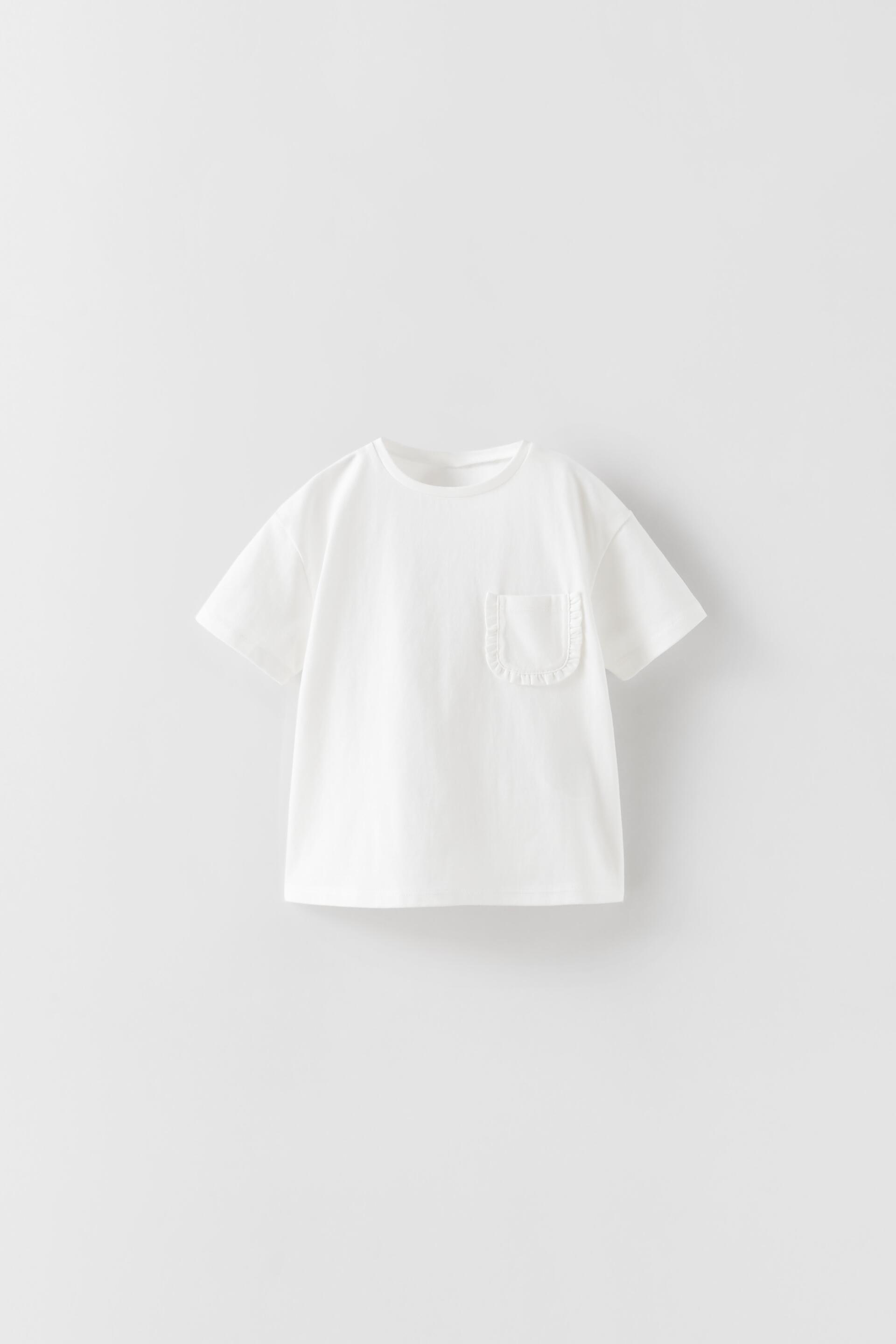 CAMISETA BOLSILLO VOLANTE Blanco ZARA Estados Unidos de America United States